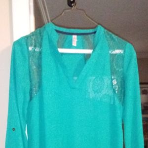 Long sleeve green lace shirt.